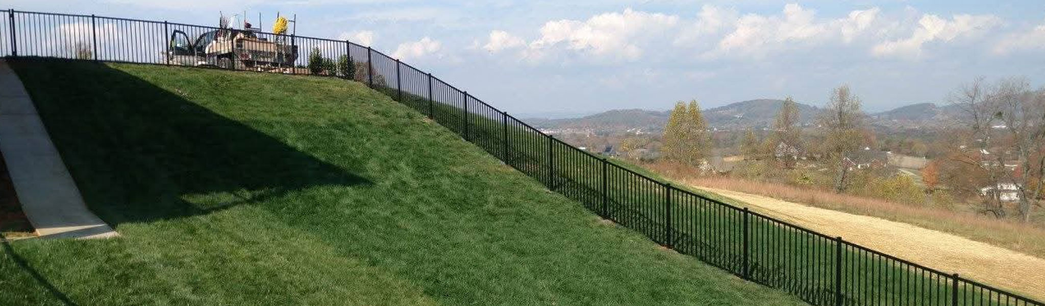 Metal Fence On Hill